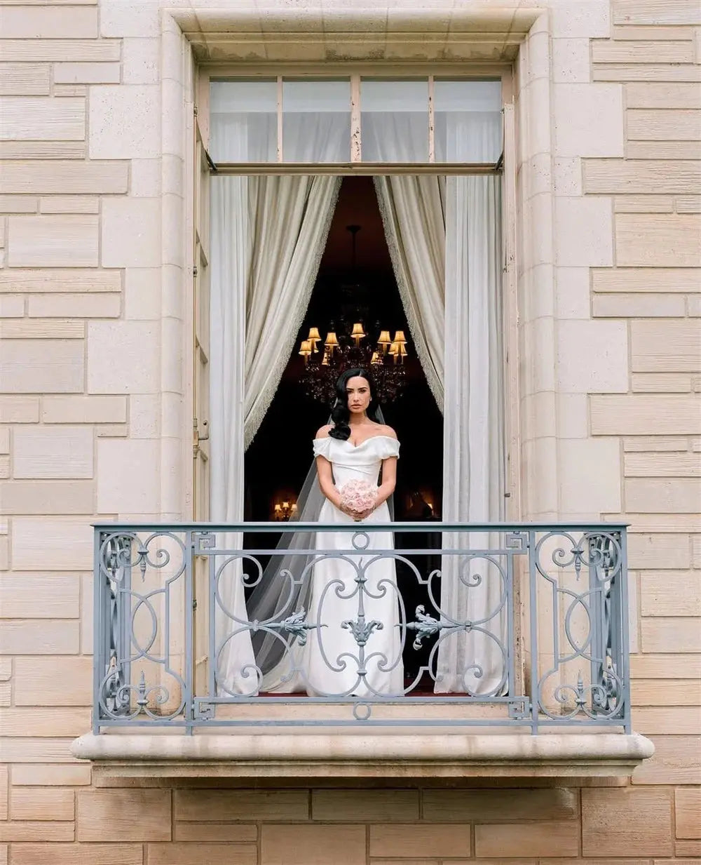 Customizable off-shoulder wedding dress with in-built bra for seamless support and comfort.