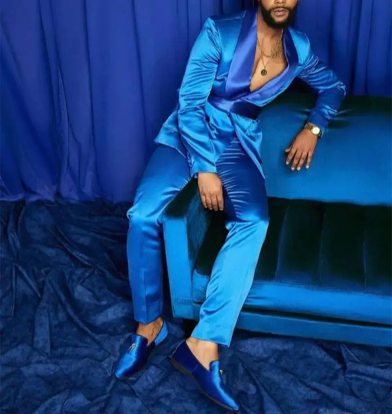 Close-up of royal blue tuxedo fabric showcasing luxurious texture.