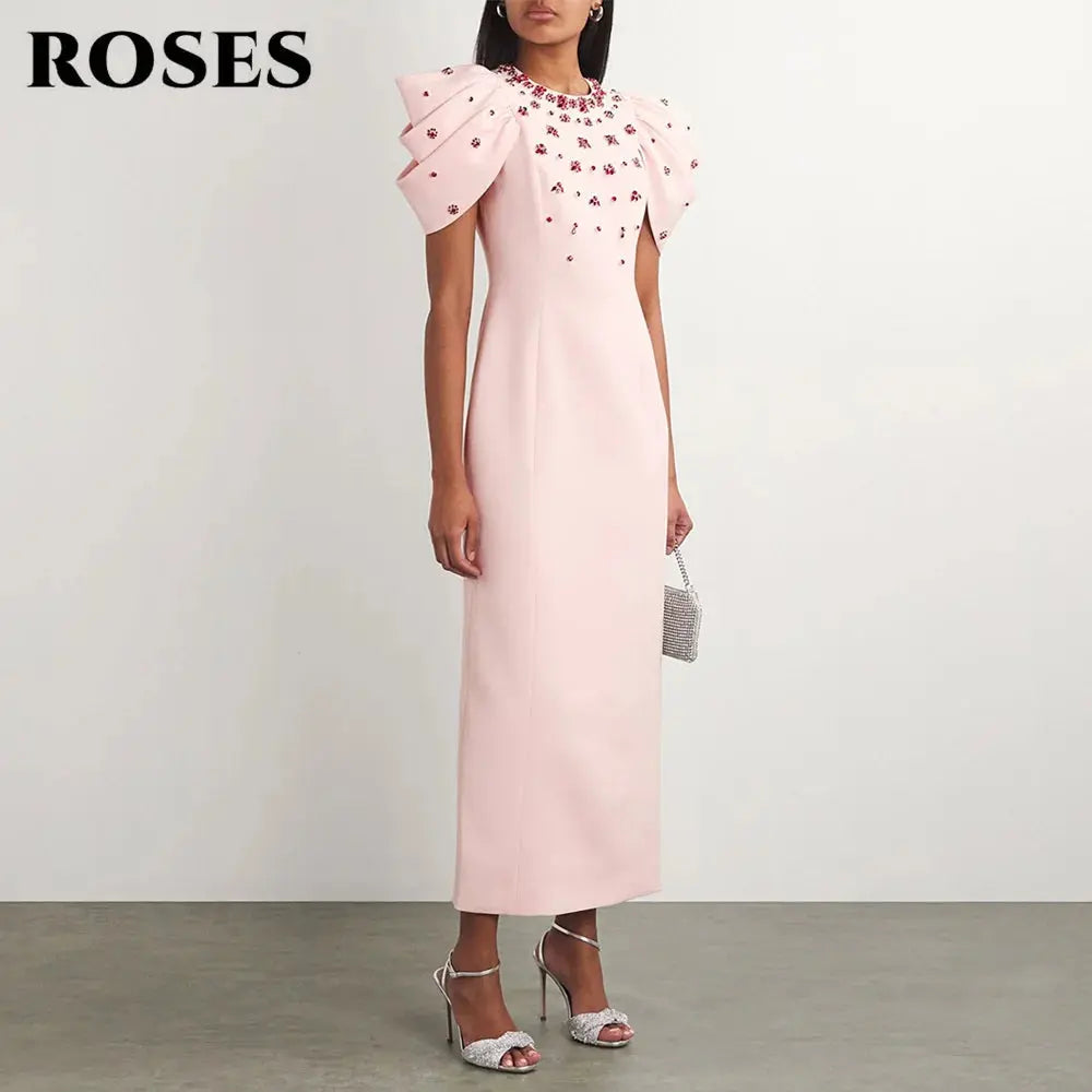 Versatile pink satin dress ideal for making an impression at events.