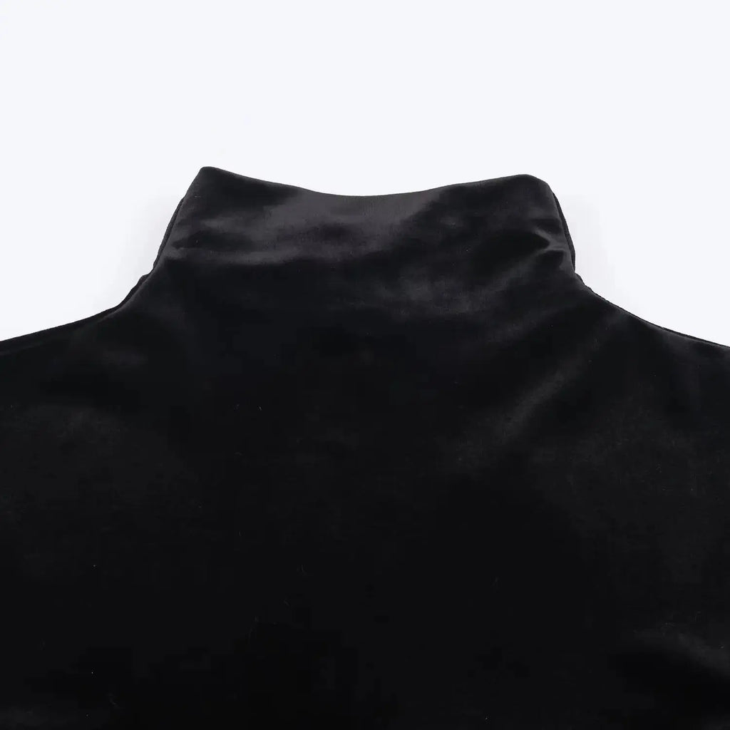Back view of the Midnight Charm Velvet Mini Dress, featuring a smooth back zip for easy wear.