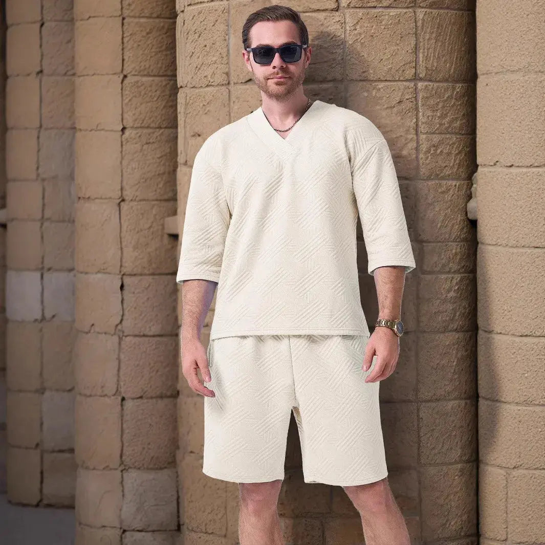 Lightweight jacquard V-neck T-shirt in soft blue, perfect for summer style.