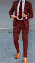 Elegant groom wearing a bespoke suit, perfect for weddings and formal attire.