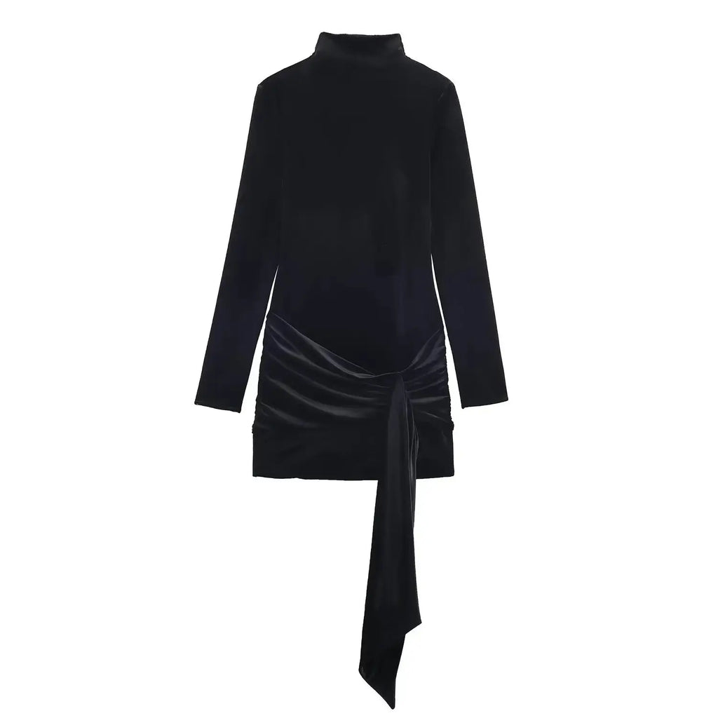 Detail shot of the long sleeves on the Midnight Charm Mini Dress, balancing sophistication with a modern touch.