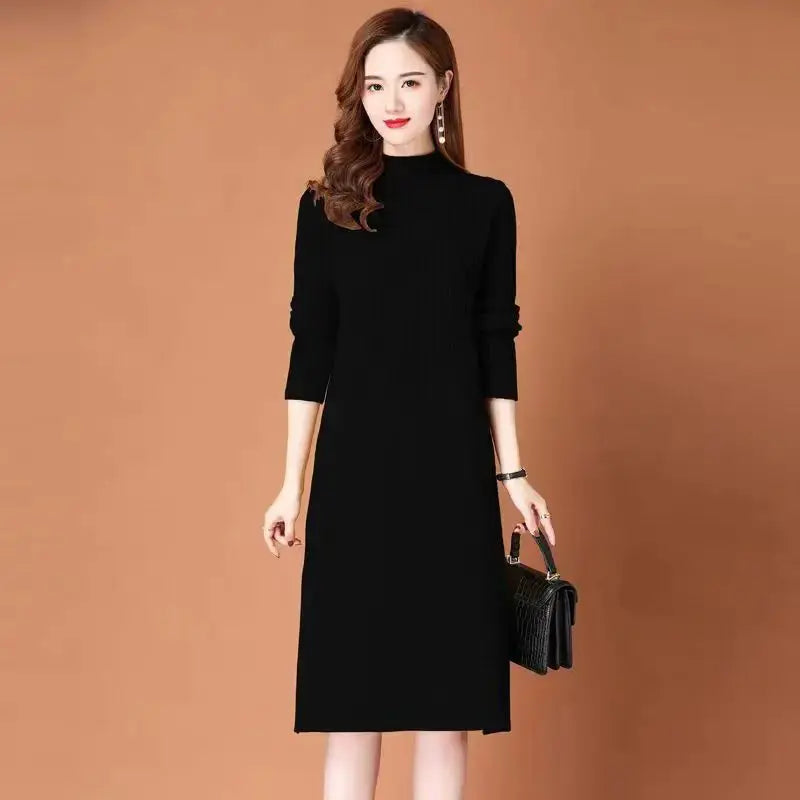 Deep blue midi-length knit sweater dress with a flattering fit, ideal for transitional winter fashion.