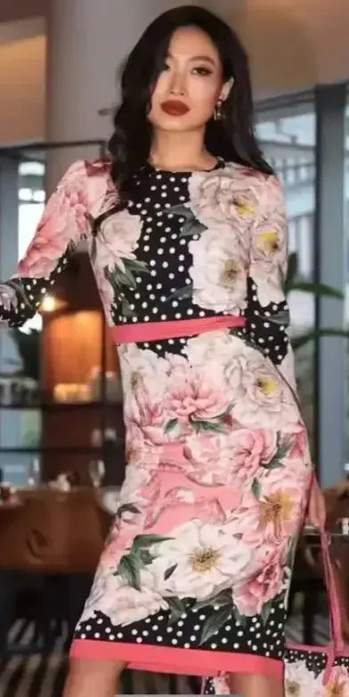 Flat lay of the Midnight Floral Silk Dress, displaying its elegant floral pattern and silk sheen.