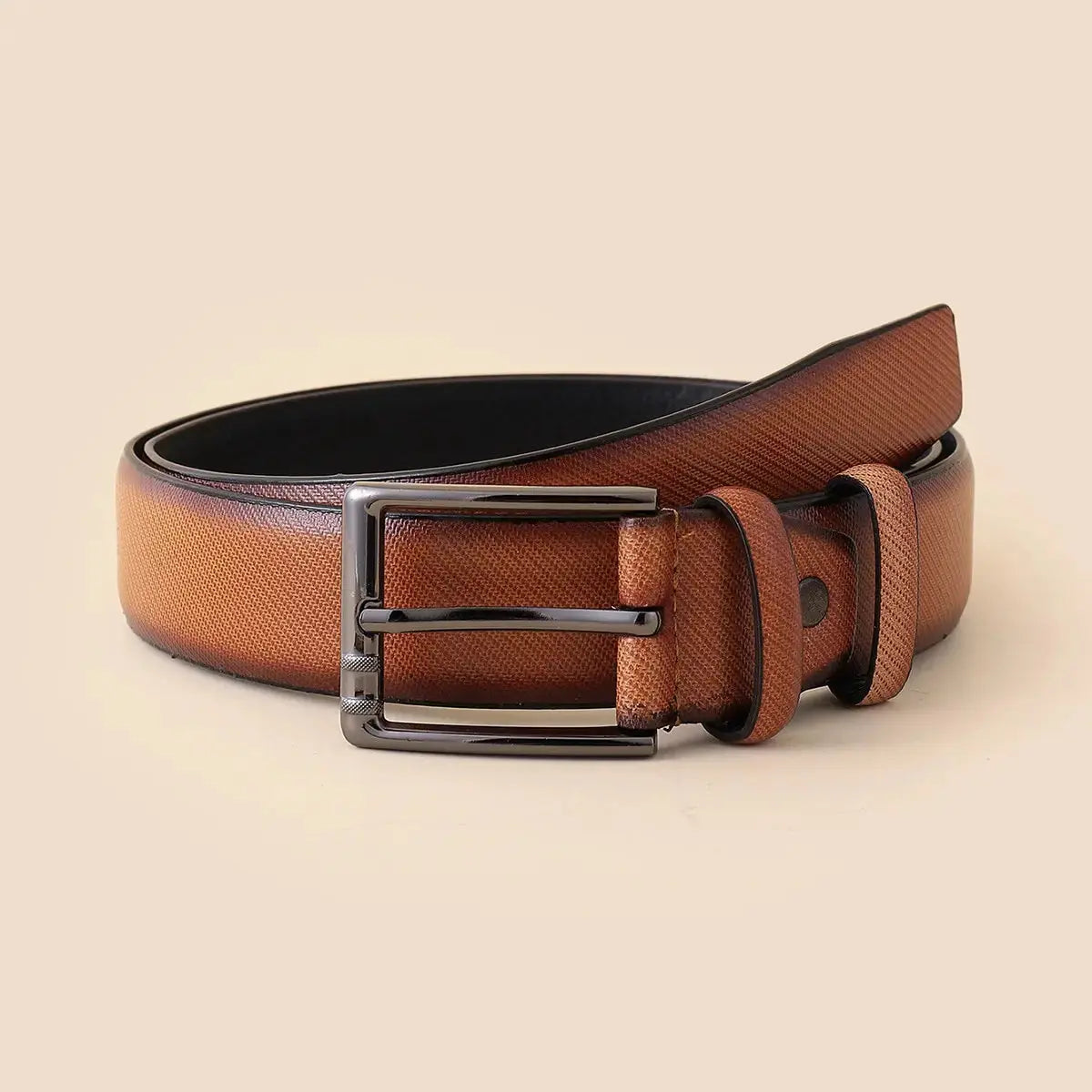 Detail of the refined pin buckle on the Command the Room belt.