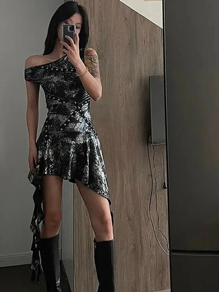 Midnight Shimmer dress in metallic fabric with dynamic ruffles and asymmetrical neckline.
