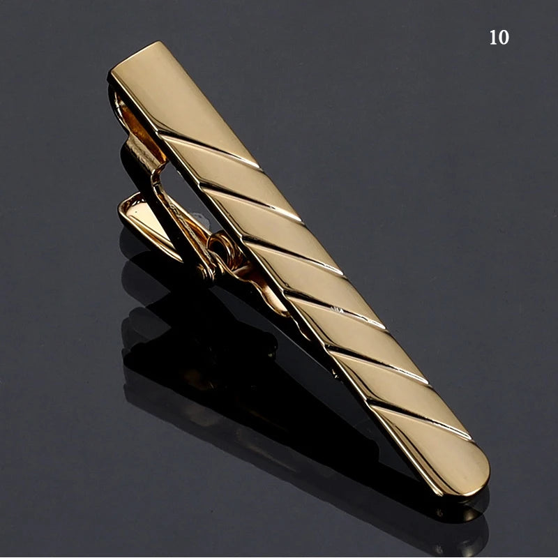 Rose gold tie clip with sleek design for a polished look.