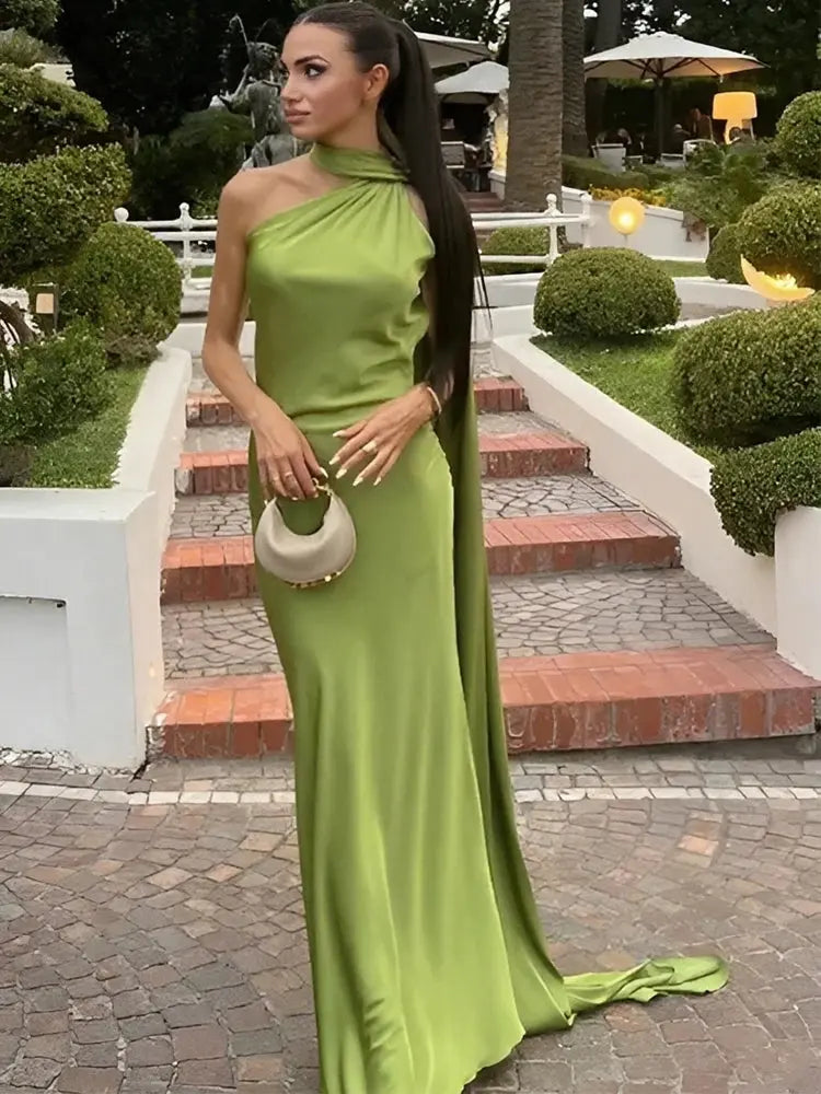 Midnight Allure Halter Gown in satin, showcasing a sleek backless design.