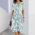 Summer Breeze Midi Dress in vibrant gradient stripes, lightweight polyester fabric.