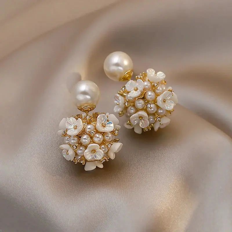 Lightweight Pearl Whispers Earrings featuring delicate resin pearls and durable zinc alloy construction.