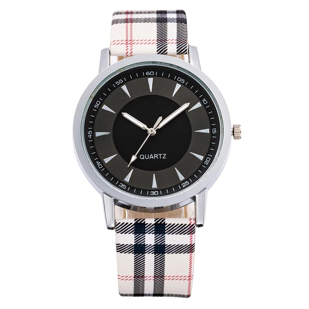 Elegant casual watch displayed on a wooden table with coffee.