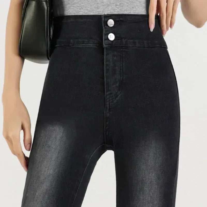 Model wearing Midnight Whisper Jeans, demonstrating versatility for day to night styling.