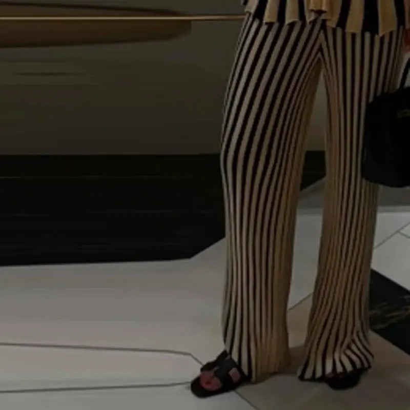 Back view of the tailored straight-leg pants, highlighting the modern office clothes design.