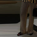 Back view of the tailored straight-leg pants, highlighting the modern office clothes design.