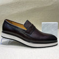 Boardroom ready slip-on leather loafers featuring streamlined pointed toe and 2.8cm heel