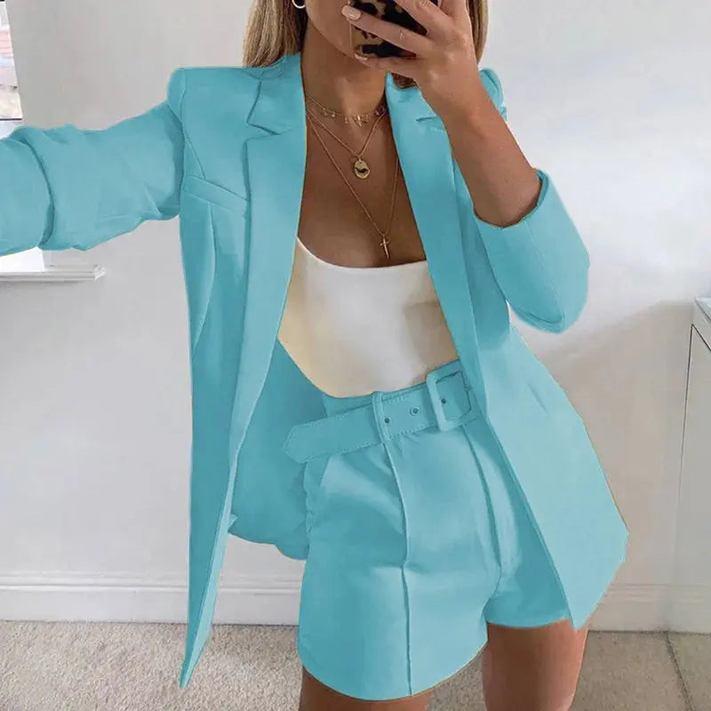 Navy chic blazer and shorts set, ideal for casual sophisticated events.