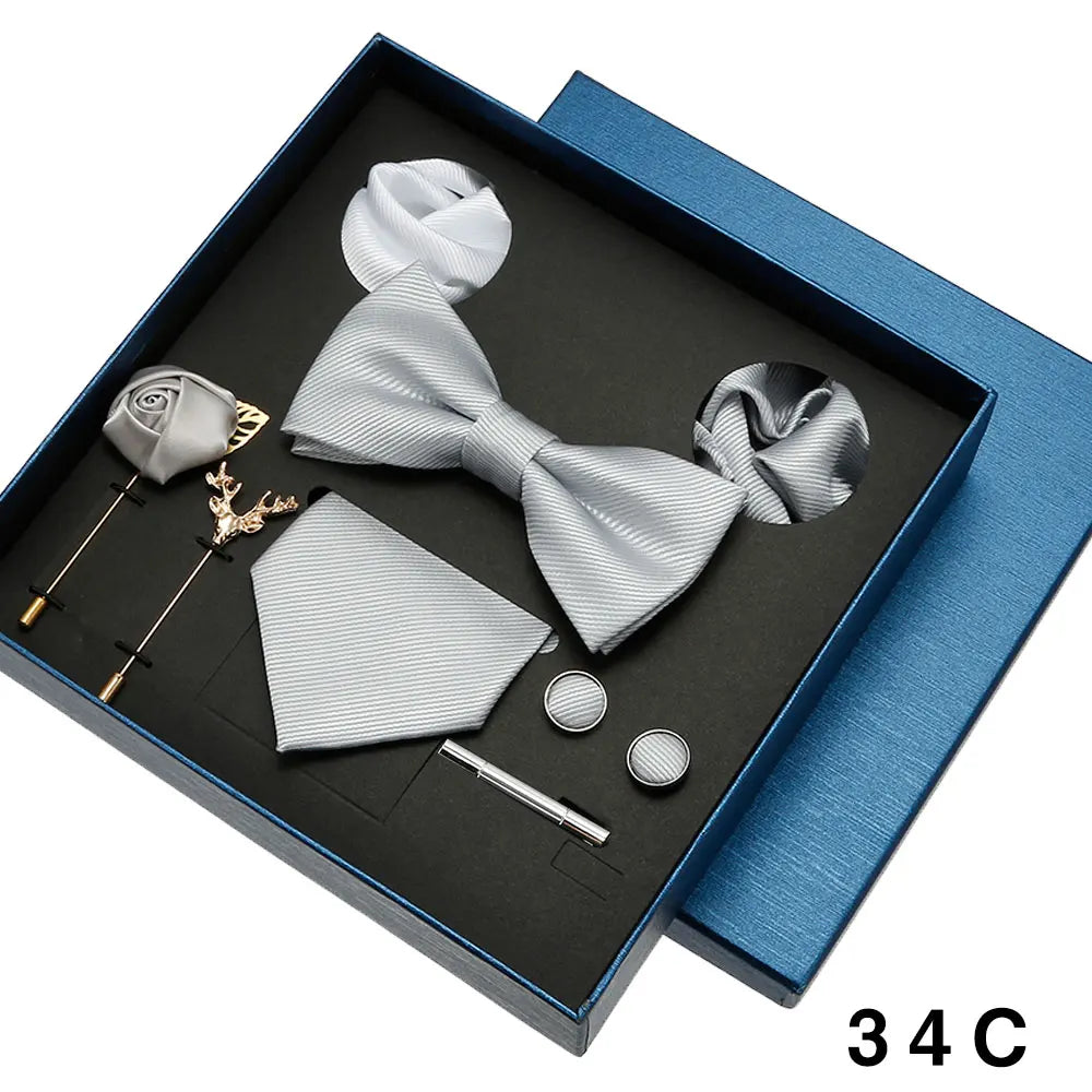 Classic formal wear set featuring necktie, bowtie, handkerchief and elegant cufflinks