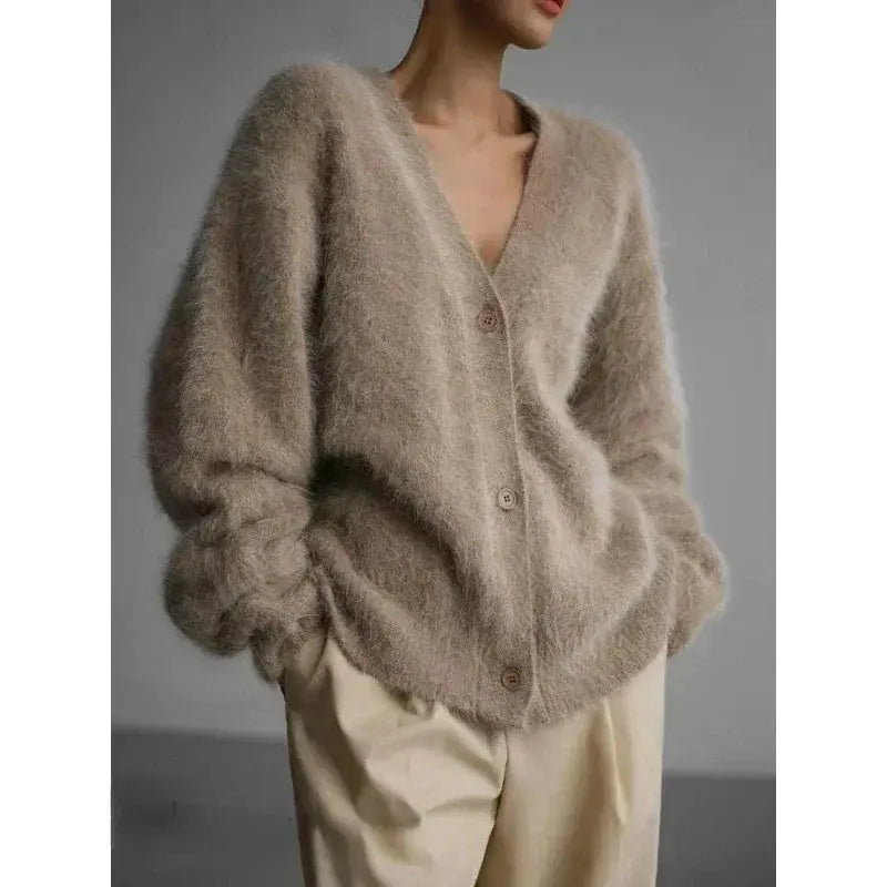 Elegant button-down cardigan showcasing long flowing lines.