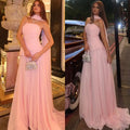 Strapless chiffon evening gown in deep navy with a flowing Watteau train.