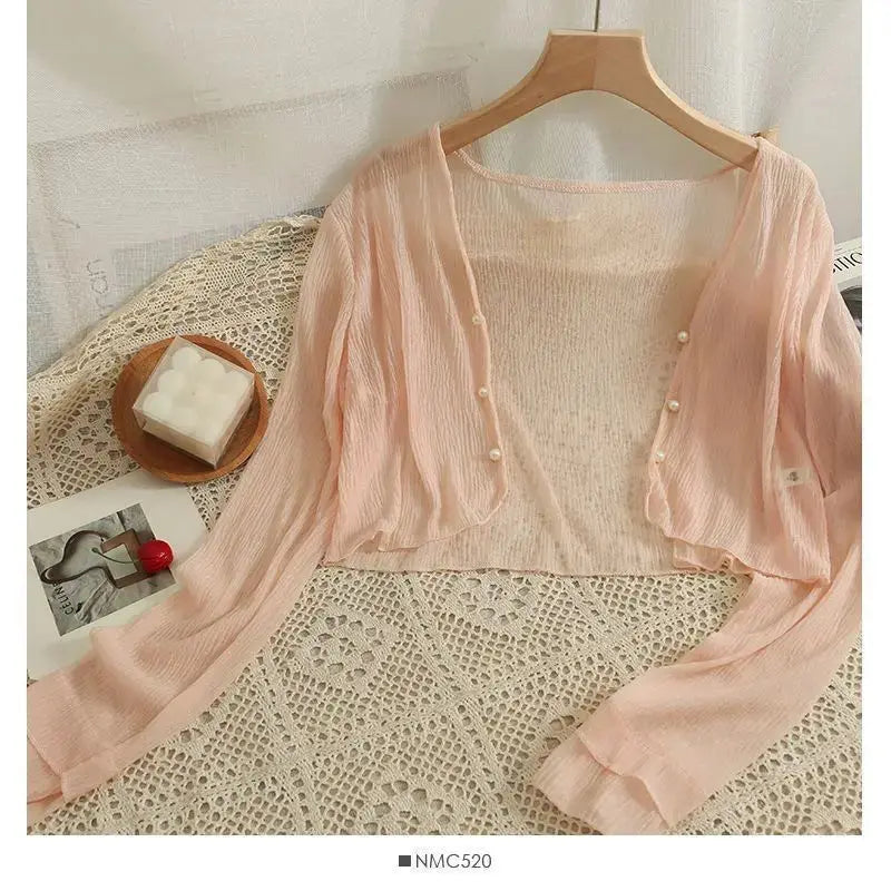 Versatile Summer Breeze Cardigan paired with a summer dress for an evening look.