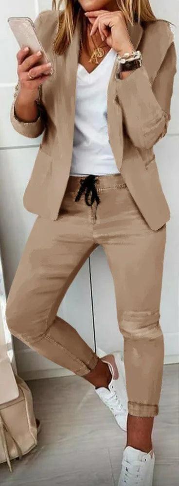 Flat lay of the Chic Office Set, featuring the blazer and trousers arranged neatly for display.