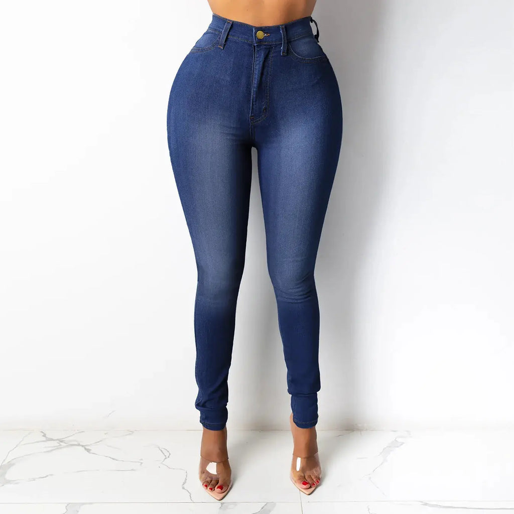 Flat lay of high-waist denim jeans with soft fabric blend, perfect for versatile styling in any wardrobe.