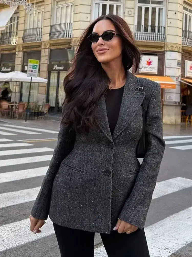 Full view of the black suit set, perfect for boardroom and social events.
