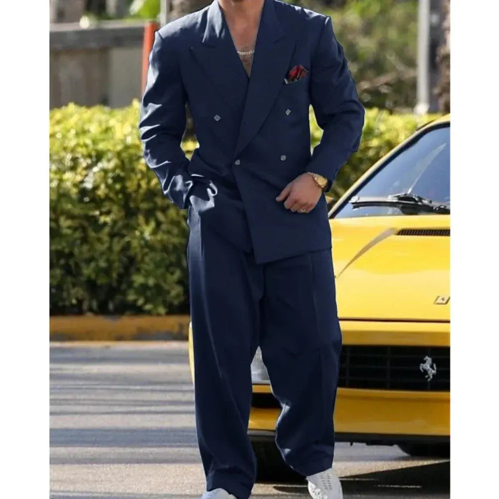 Model wearing a sophisticated gray suit, exuding confidence and power.