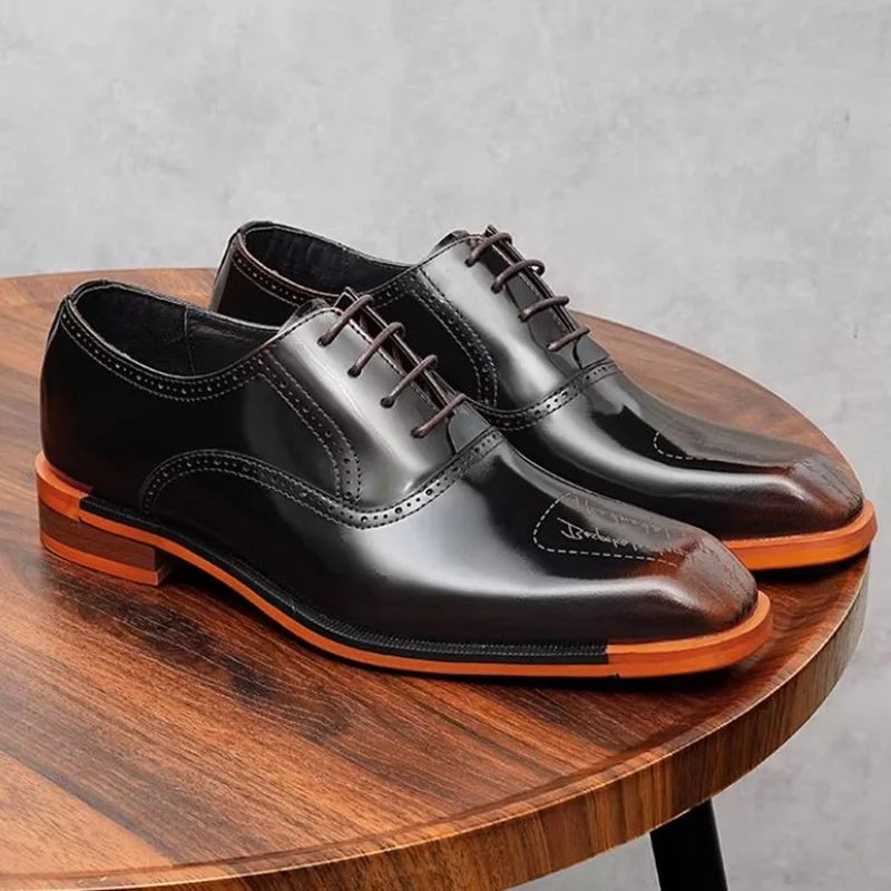 Black genuine leather oxford dress shoes with lace-up closure and rubber sole for professional business wear