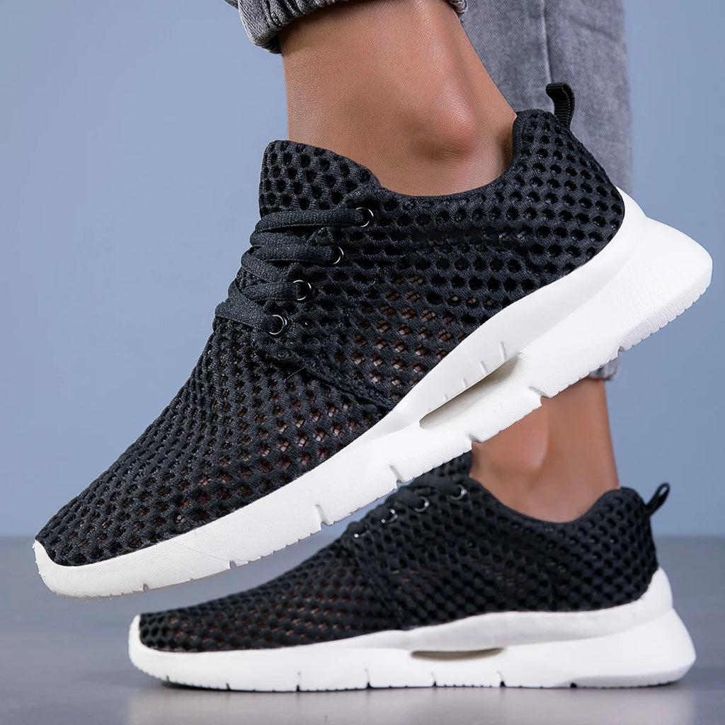 Detail of men's mesh loafer construction showing ventilated upper and reinforced stitching