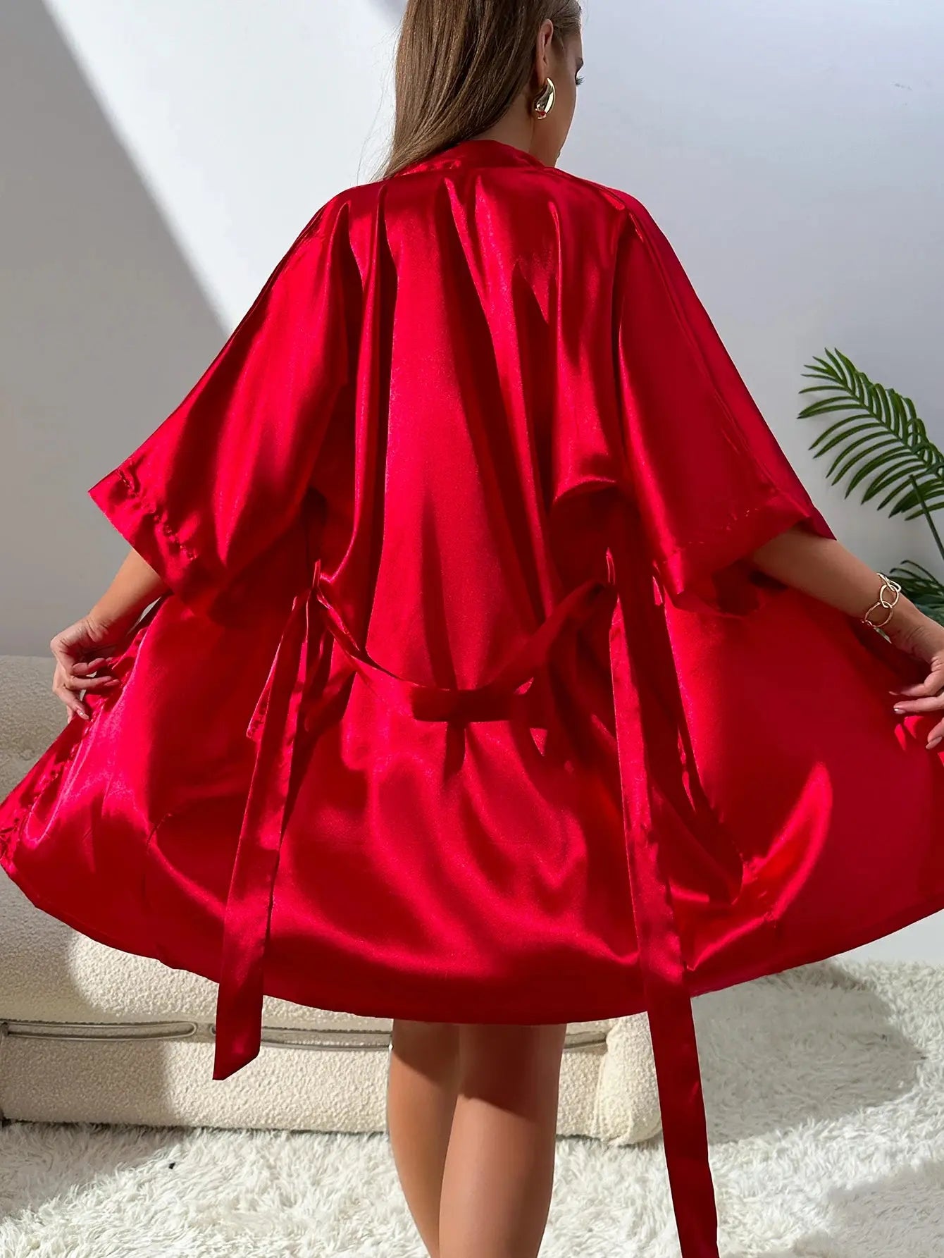 Close-up of the silky texture of the Whisper-Soft Loungewear Trio, showcasing premium polyester material.