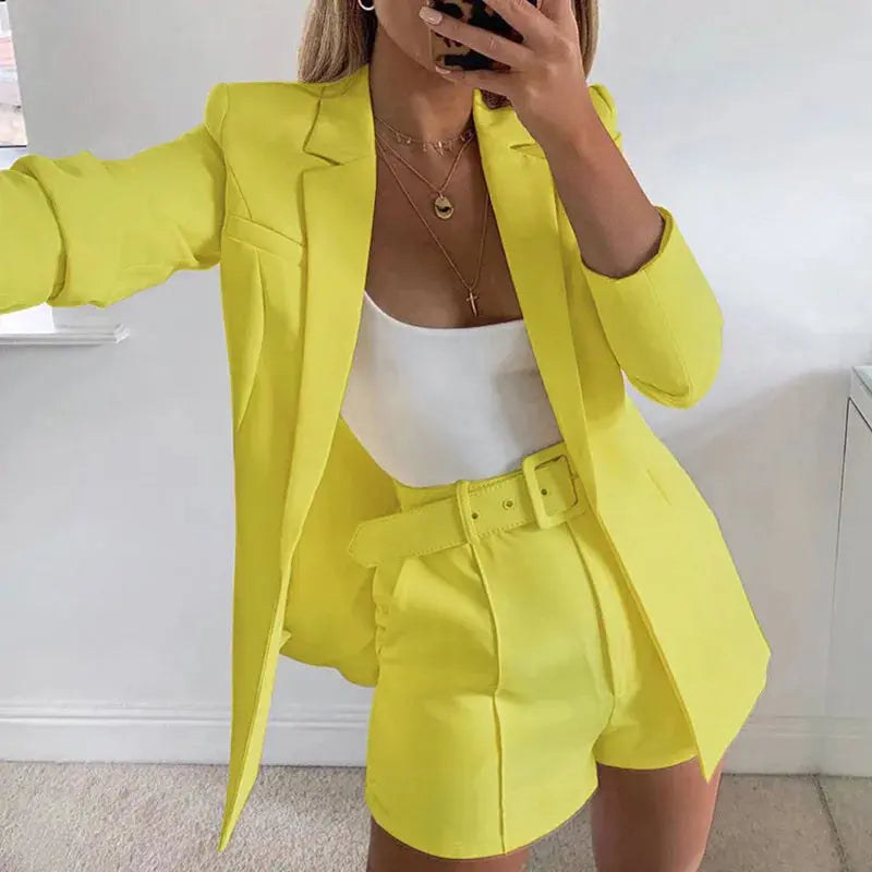 Navy blazer and shorts set, perfect for boardroom to bar outfits.