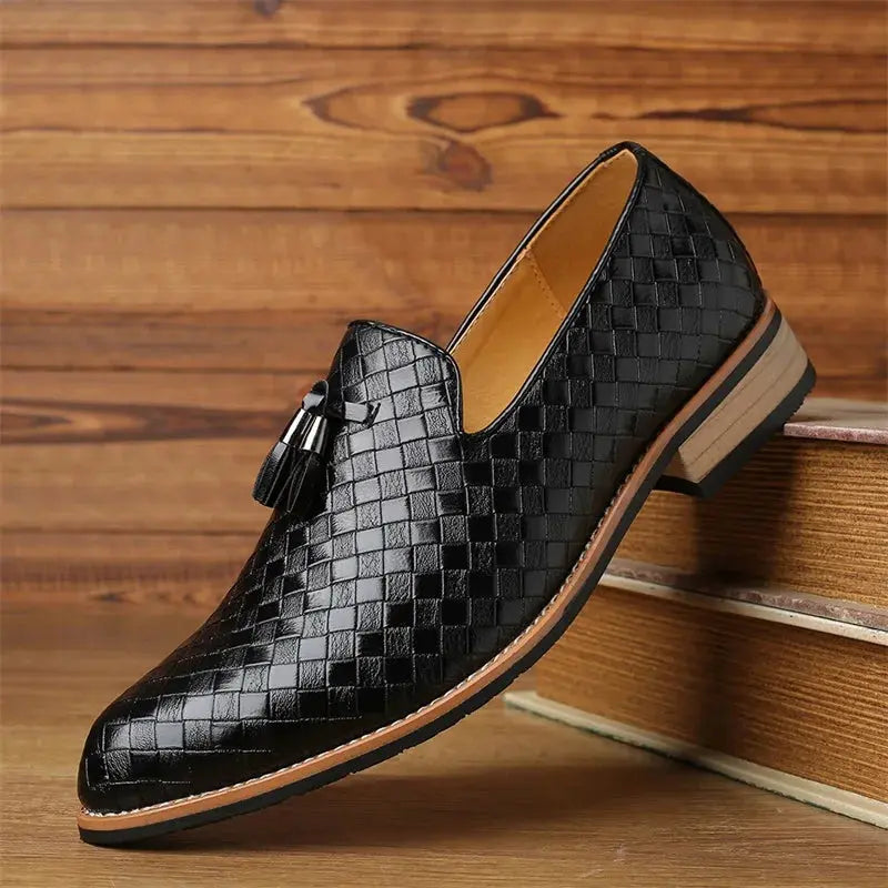 Cushioned insoles of men's luxury loafers for refined comfort.