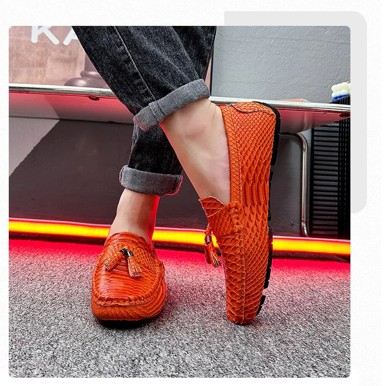 Detail of supple leather texture and elegant fretwork on slip-on loafer