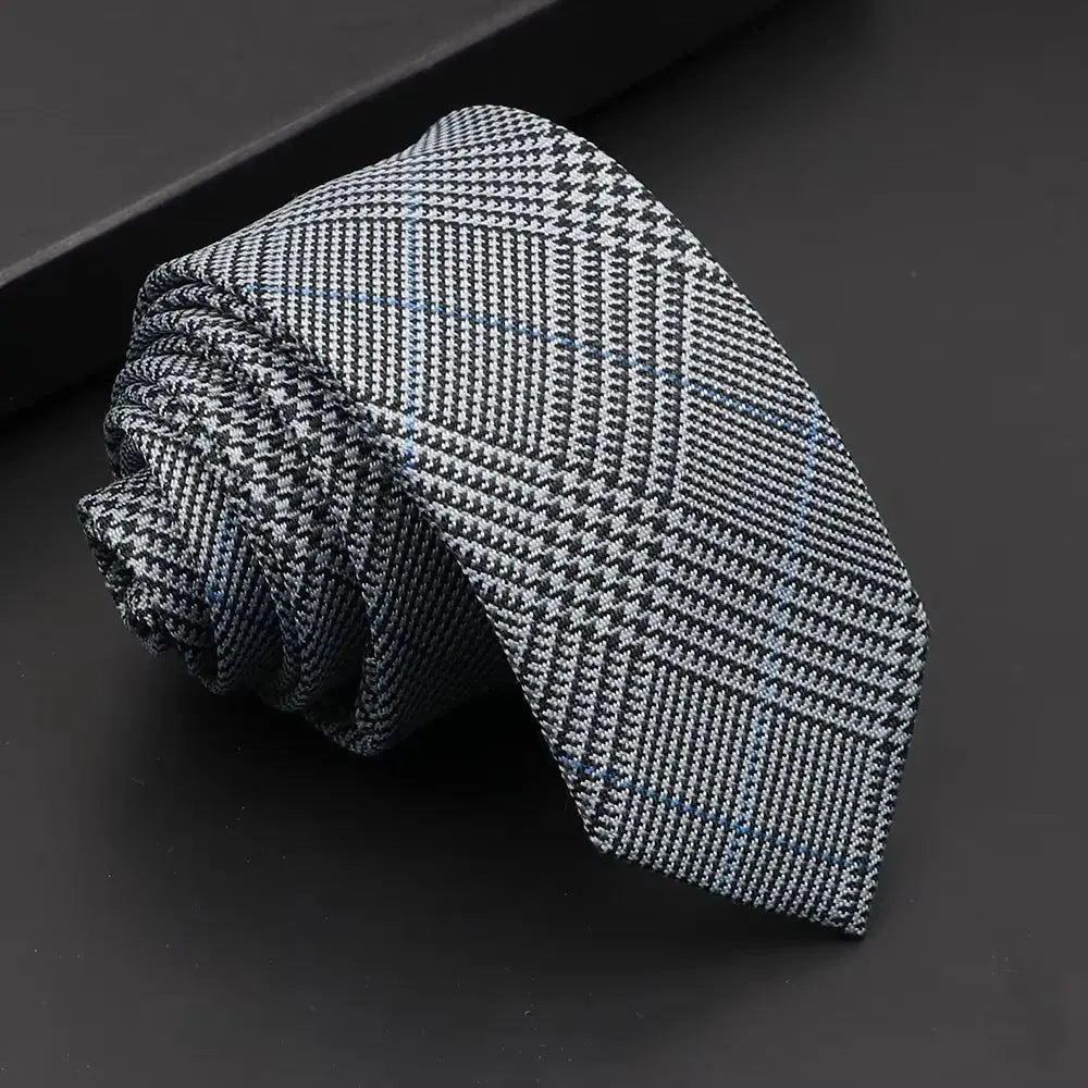 Timeless black necktie, suitable for any formal attire.