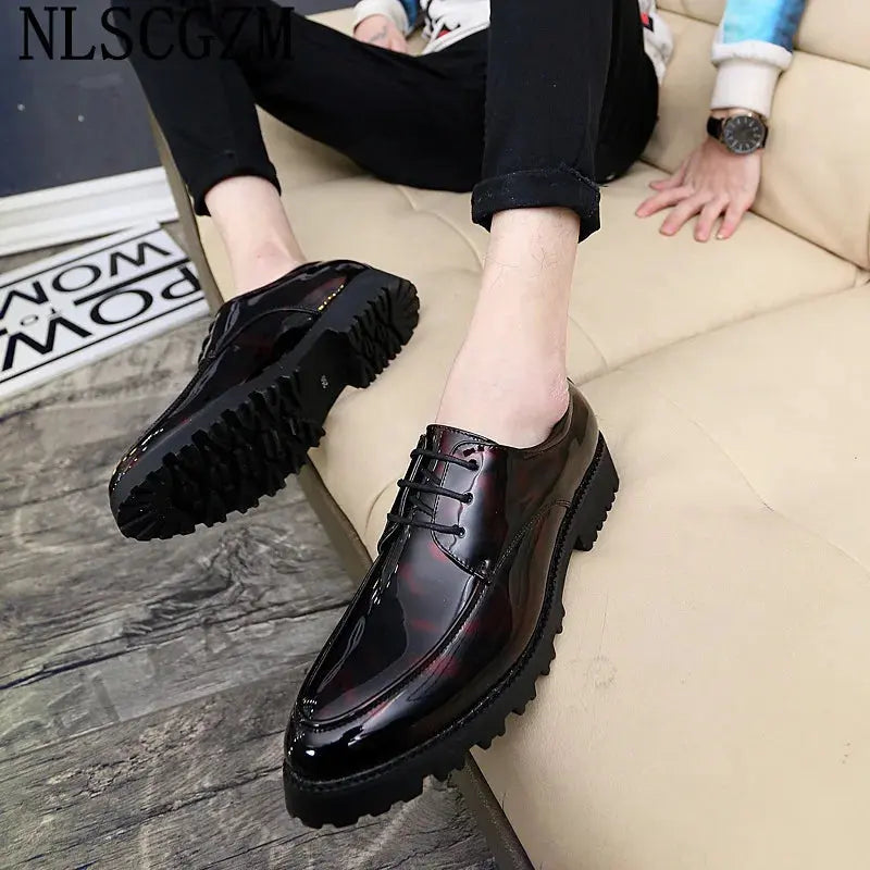 Midnight Gloss Loafers on a polished surface, highlighting their shine.