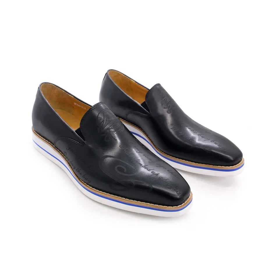 Detailed view of handmade leather loafers with laser-etched texture and premium leather finish