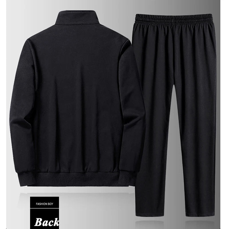 Model wearing the Autumn Comfort Tracksuit while jogging through colorful autumn foliage.