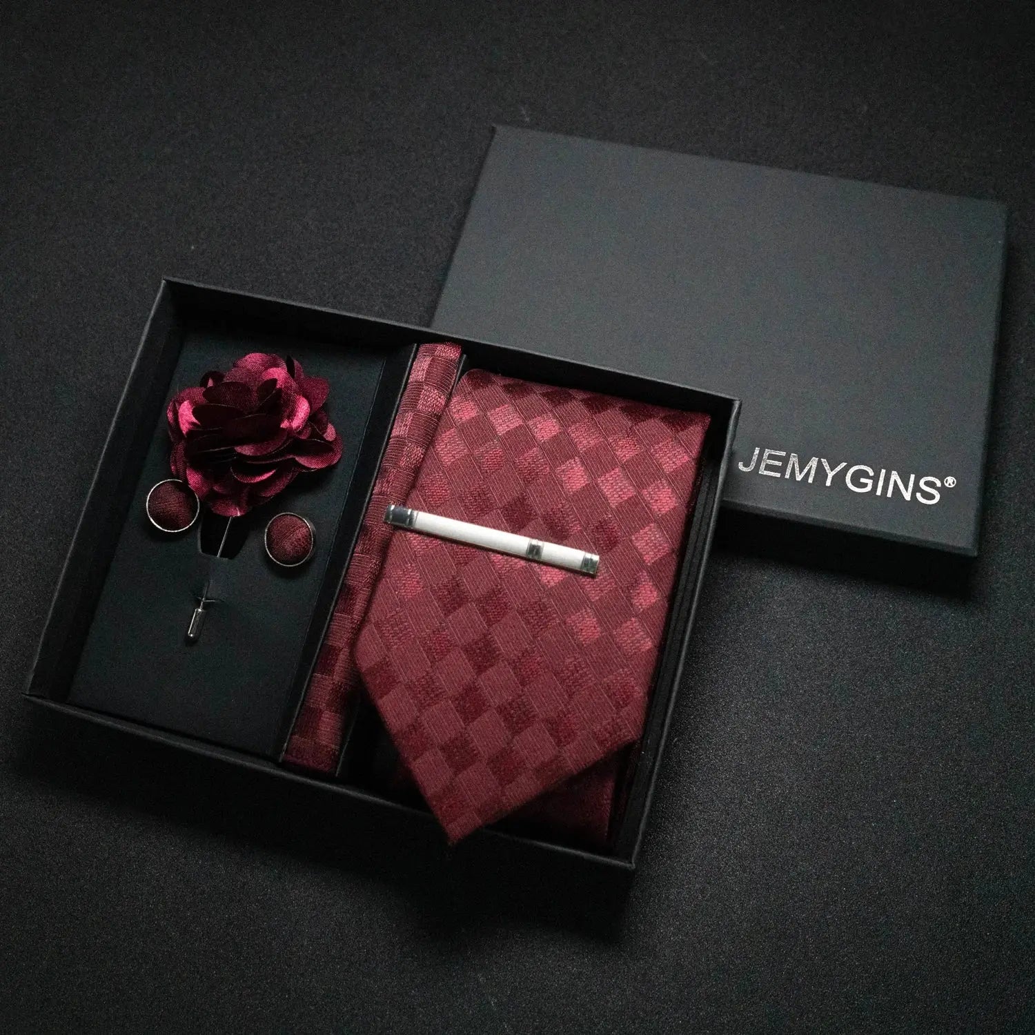 Elegant wine-red paisley tie set with a sophisticated look.