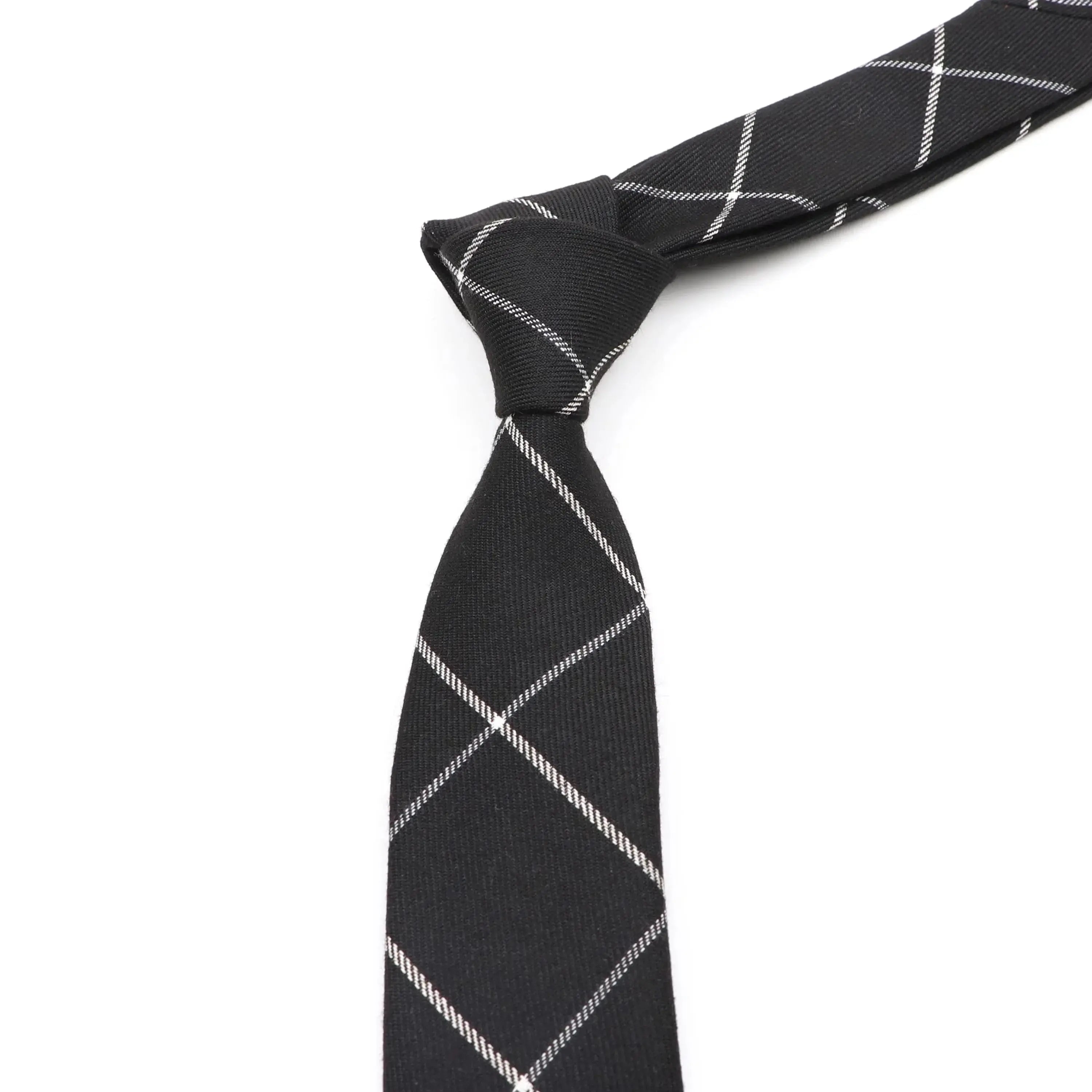Handcrafted black necktie with a modern slim profile for a refined look.