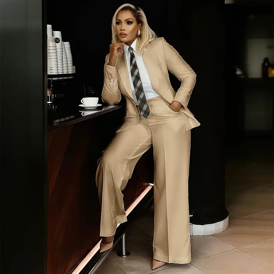 Model confidently presenting in a chic white suit set.