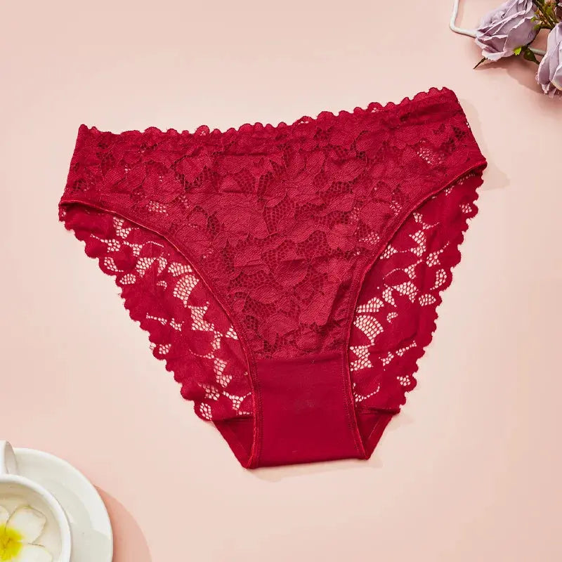 Flat lay of high-waist lace briefs in white, perfect for comfortable everyday lingerie.
