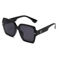 Side view of square frame sunglasses highlighting their elegant design.
