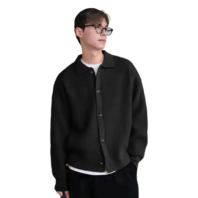 Back view of the streamlined fit of a sleek knit cardigan, designed for movement and elegance.