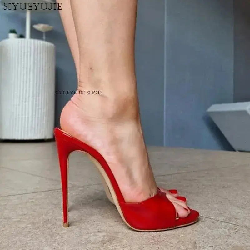 Glamorous leopard print slippers featuring premium kid suede and leg-lengthening heel