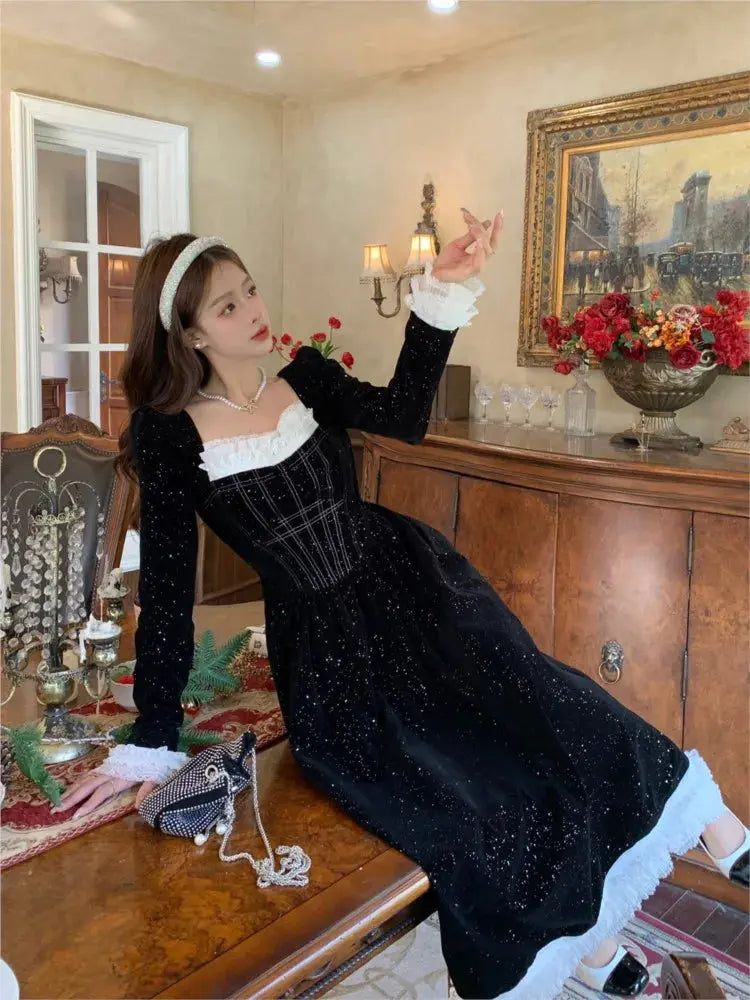 Model wearing the Midnight Whispers Velvet Dress, highlighting the flattering A-line silhouette.