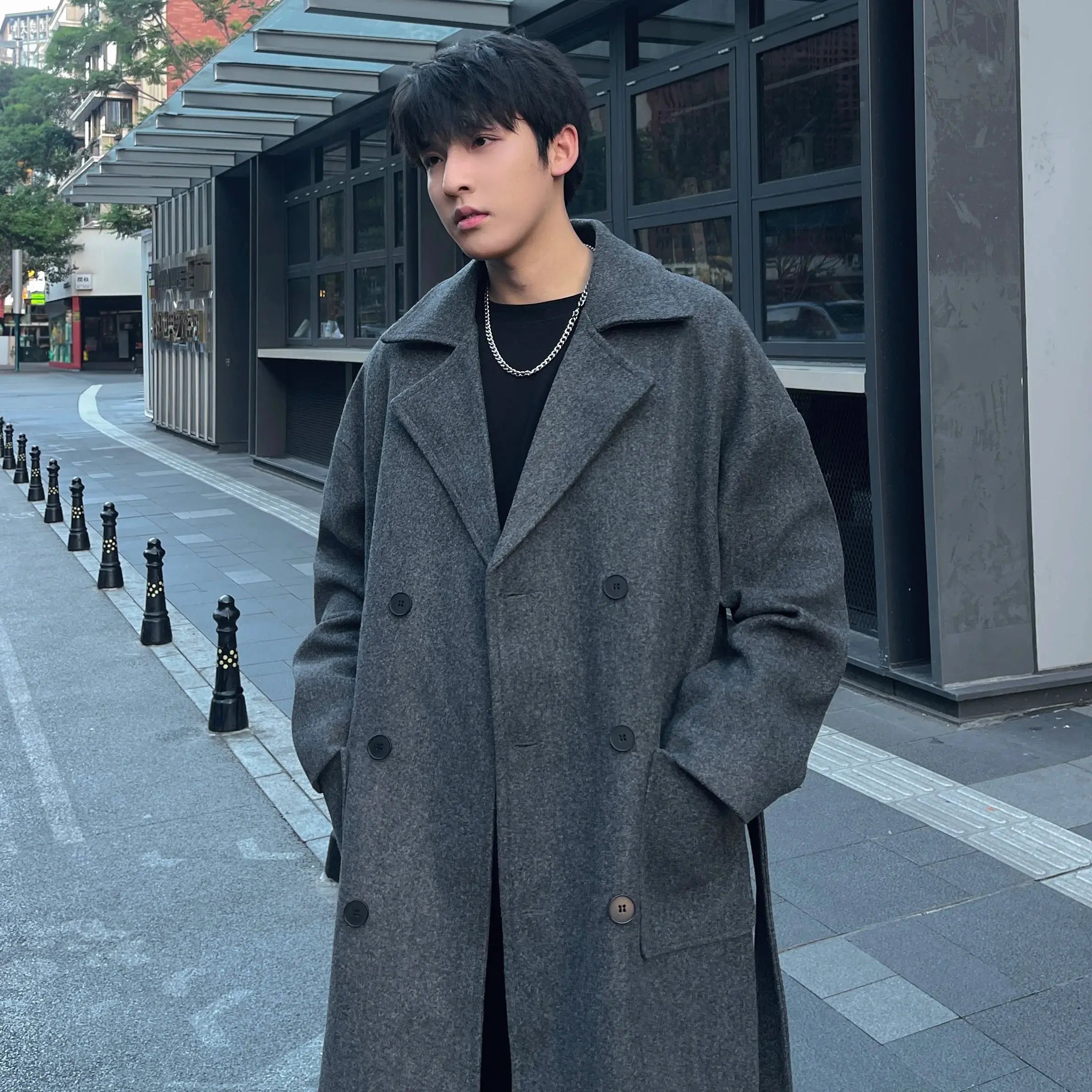 Winter Sentinel coat displayed on a model, highlighting its versatility for casual and formal wear.