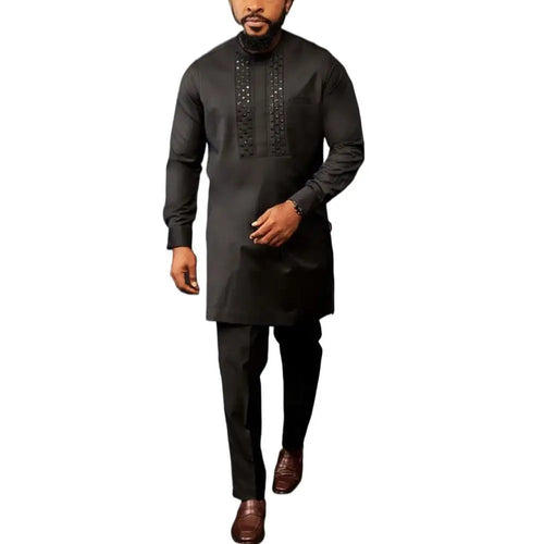 Men's pullover style African suit with coordinating top and bottom in vibrant cultural print
