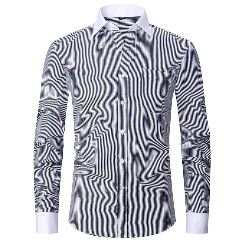 Model adjusting the cuffs of the white shirt, showcasing its fit.